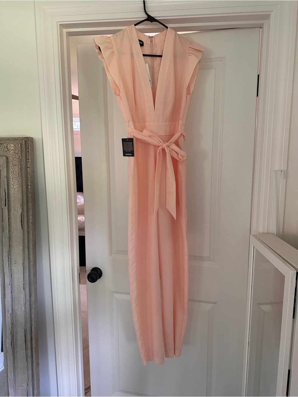 bebe blush pink V-neck jumpsuit